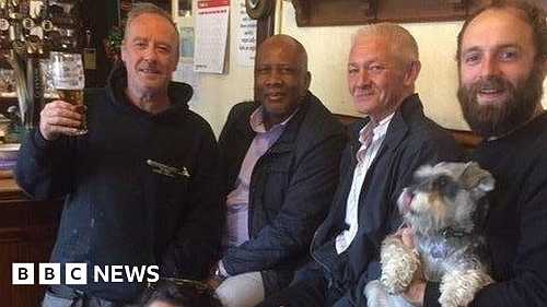 African king's surprise visit for pub regulars