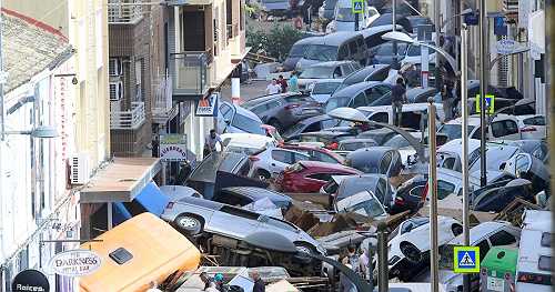 Photos: Spain races to find survivors as floods kill at least 95
