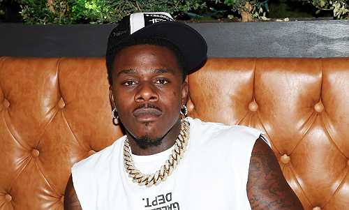 Quality Time? Social Media Weighs In On DaBaby Teaching His Daughter How To Shoot A Gun (VIDEO)