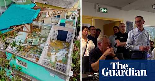 Mayotte: drone footage shows cyclone damage as French official tells rescuers not to panic – video