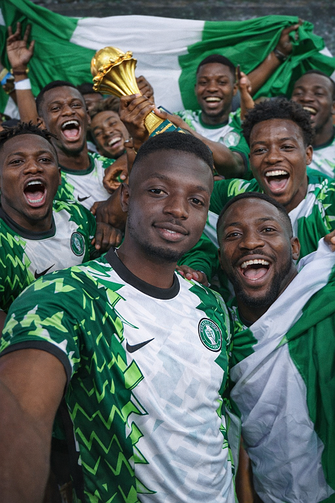 Me with our Nigeria squad celebrating our win vs Algeria